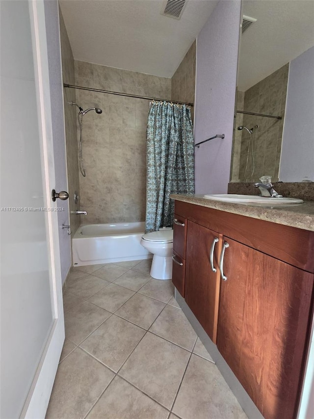 full bathroom with tile patterned flooring, vanity, toilet, and shower / tub combo with curtain