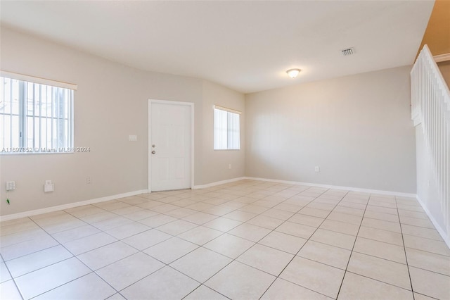 view of tiled spare room