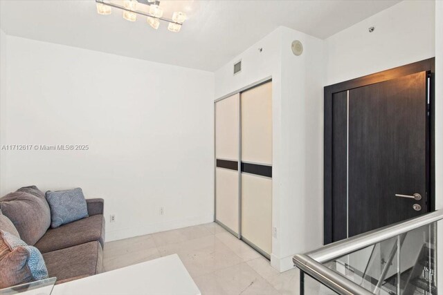 60 SW 13th St Unit 4606, Miami, FL 33130 - living area with baseboards