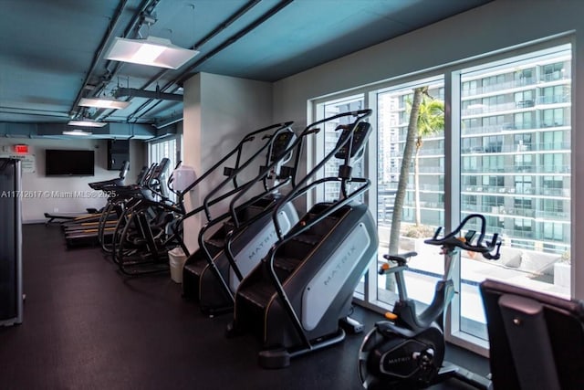 60 SW 13th St Unit 4606, Miami, FL 33130 - gym featuring healthy amount of natural light and a garage