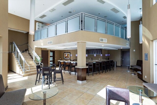 60 SW 13th St Unit 4606, Miami, FL 33130 - common area featuring a towering ceiling and stairway