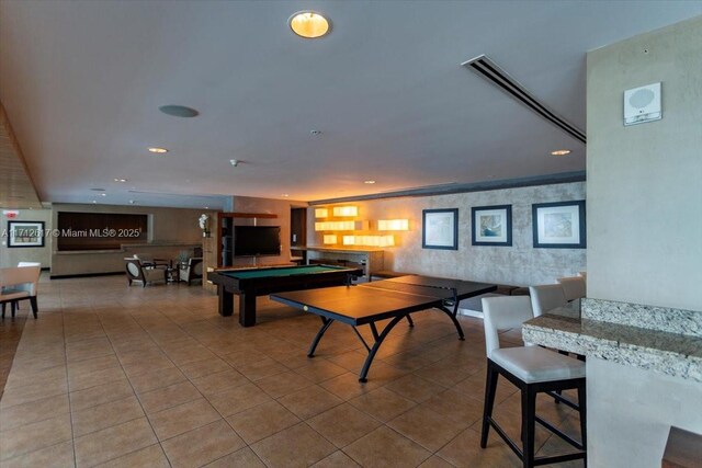 rec room featuring light tile patterned floors and pool table