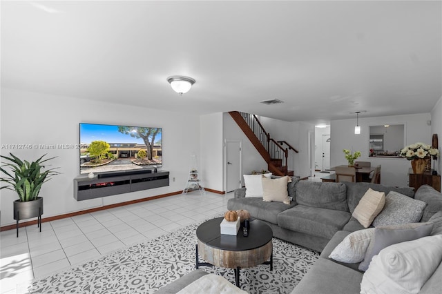 living room with light tile patterned flooring