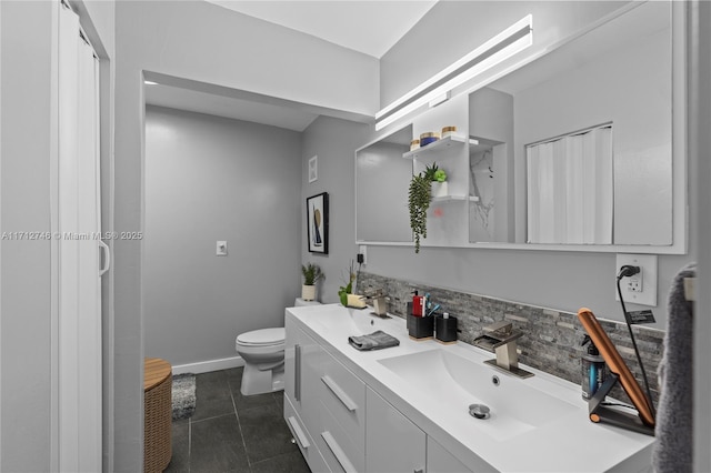 bathroom with toilet, tile patterned flooring, vanity, and decorative backsplash