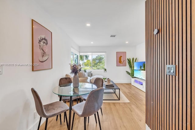 dining room featuring light hardwood / wood-style floors