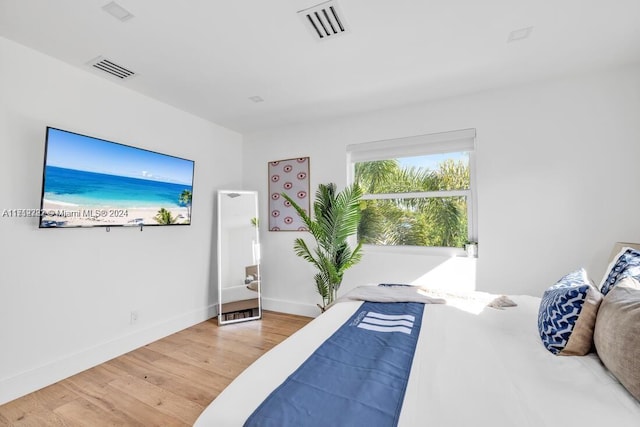 bedroom featuring wood-type flooring