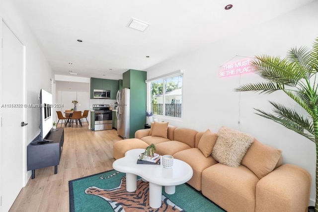 living room with light wood-type flooring