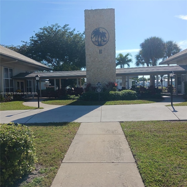 1115 Lake Ter Unit 206, Boynton Beach, FL 33426 - surrounding community featuring a lawn