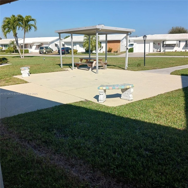 exterior space with a yard