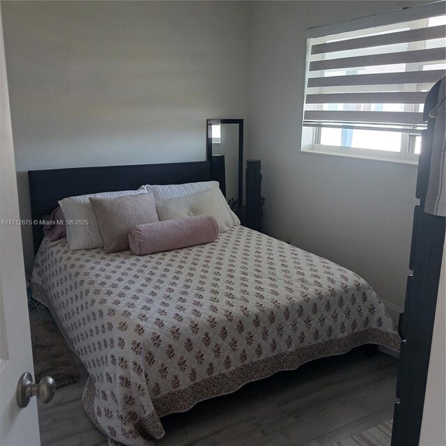 1115 Lake Ter Unit 206, Boynton Beach, FL 33426 - bedroom with wood finished floors