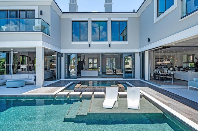 view of swimming pool with an outdoor living space