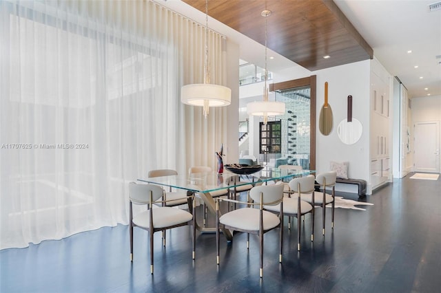 dining area featuring wood ceiling