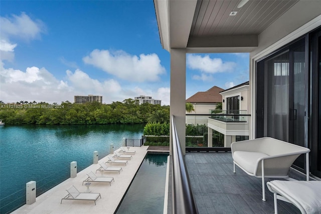 balcony featuring a water view