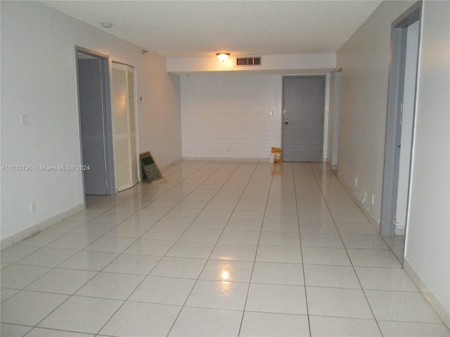 view of tiled spare room