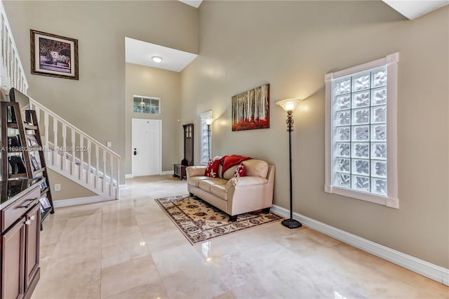 entrance foyer featuring a high ceiling