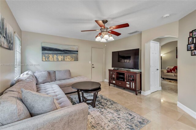 living room with ceiling fan