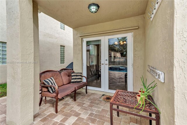 mediterranean / spanish-style house featuring a front yard and a garage