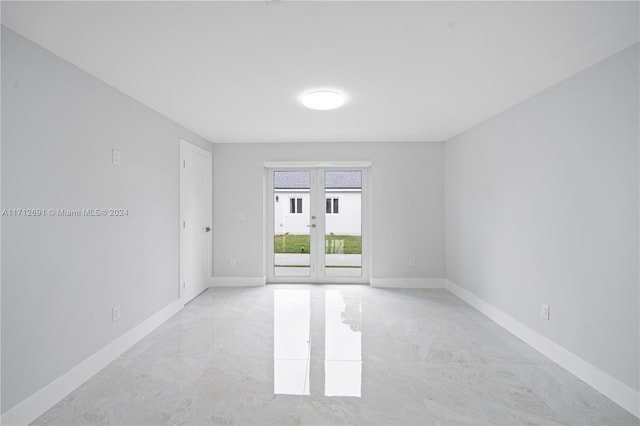 spare room with french doors