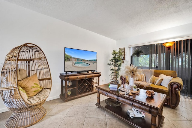 tiled living room with a textured ceiling