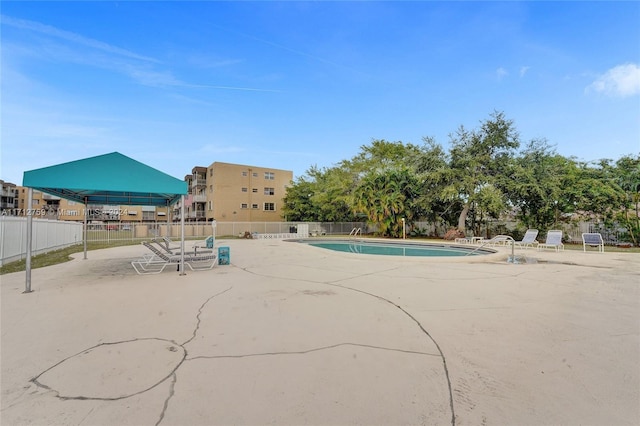 view of pool with a patio