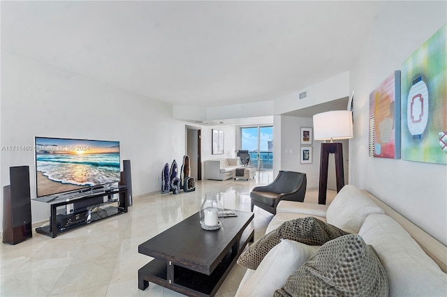 living room featuring light tile patterned flooring