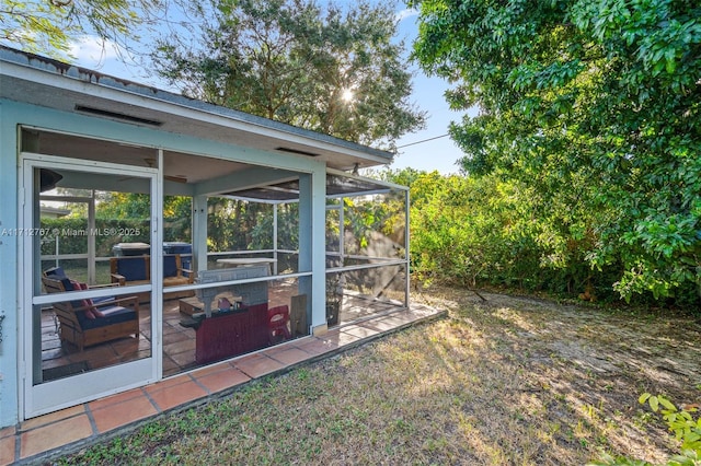 view of yard with a sunroom