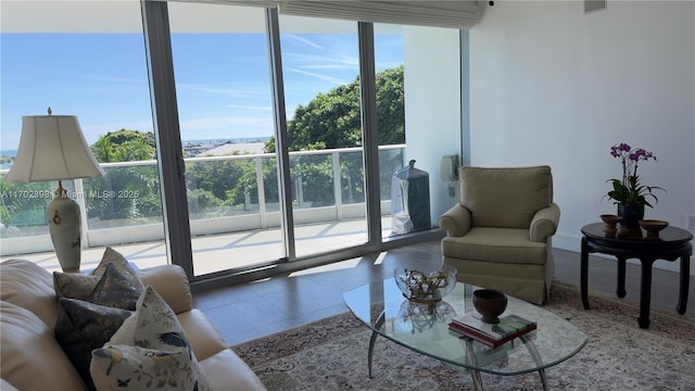 living room with tile patterned floors