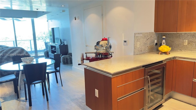 kitchen with wine cooler and backsplash