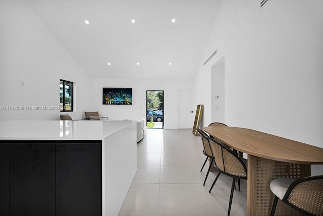 kitchen with lofted ceiling