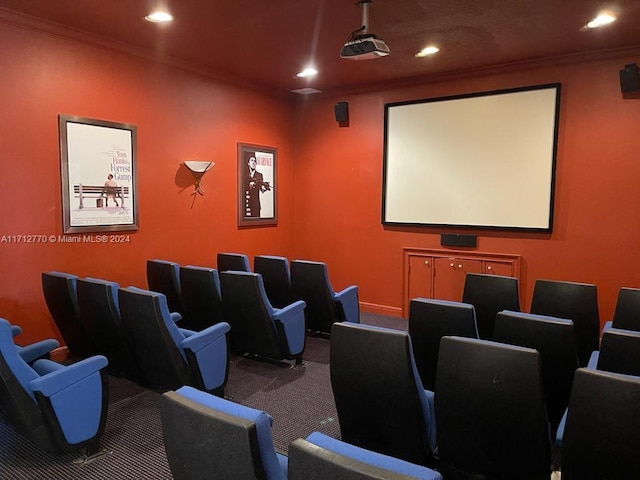 cinema with carpet floors and ornamental molding