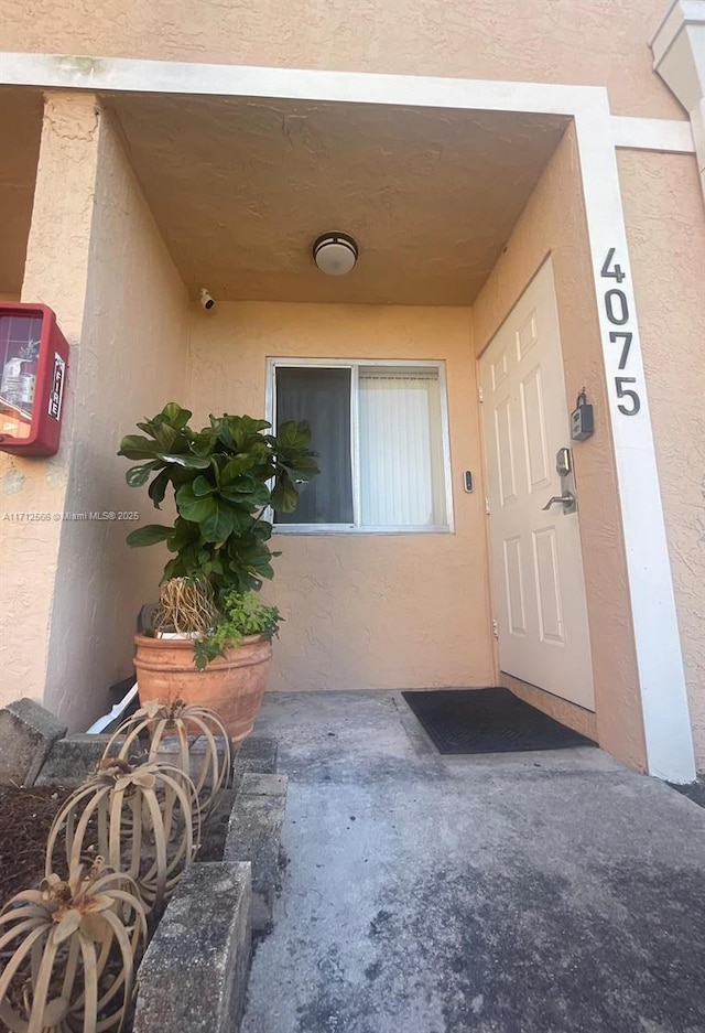 4075 Coral Springs Dr Unit 5, Coral Springs, FL 33065 - property entrance featuring stucco siding