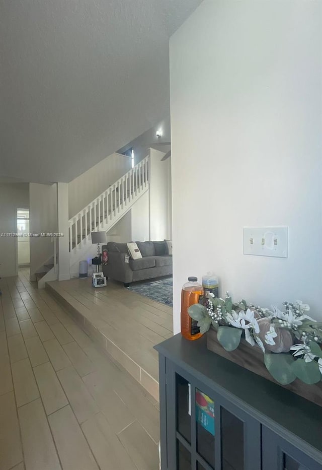 4075 Coral Springs Dr Unit 5, Coral Springs, FL 33065 - living area with tile patterned floors and stairs