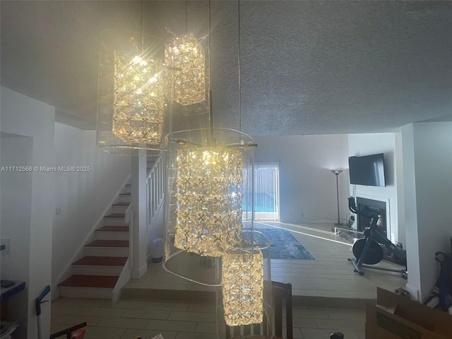 4075 Coral Springs Dr Unit 5, Coral Springs, FL 33065 - tiled dining space featuring stairway and an inviting chandelier