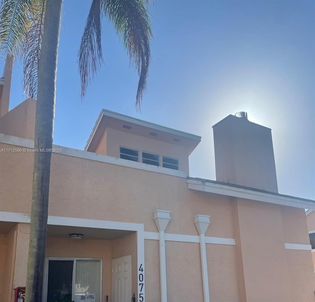 4075 Coral Springs Dr Unit 5, Coral Springs, FL 33065 - exterior details with stucco siding