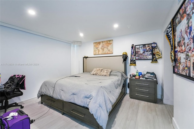 bedroom featuring light hardwood / wood-style floors