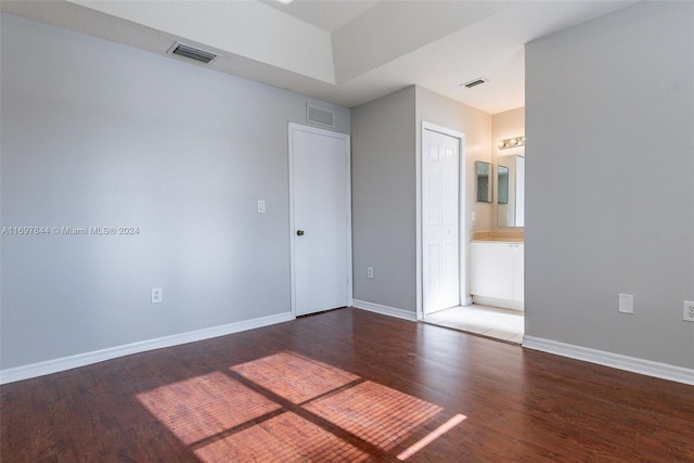 spare room with hardwood / wood-style floors