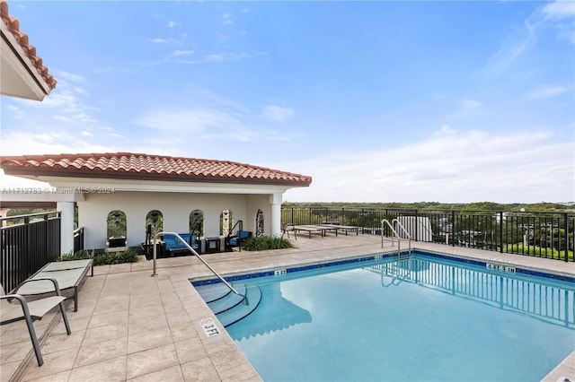 view of pool with a patio area