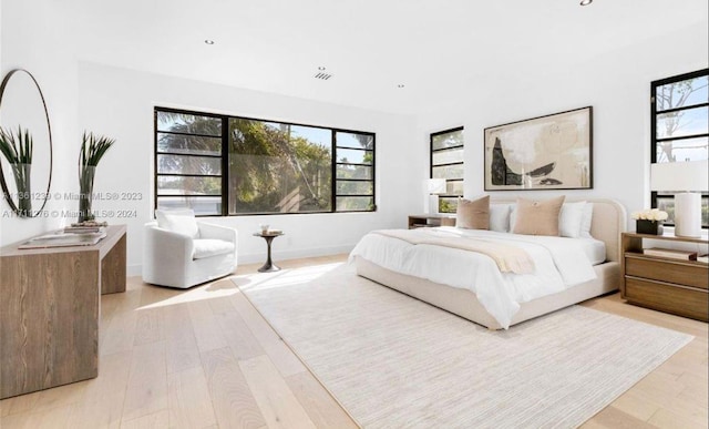 bedroom featuring light wood-type flooring