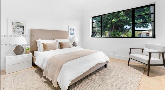 bedroom featuring light hardwood / wood-style floors