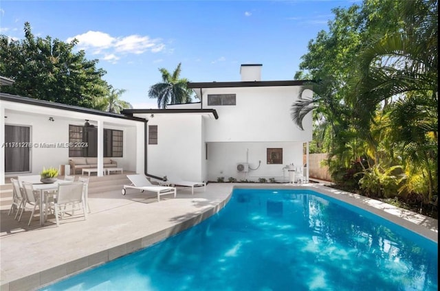 rear view of house featuring a patio