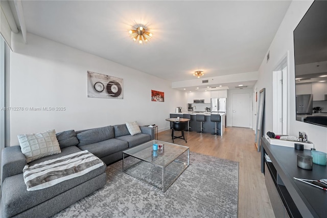 living room with hardwood / wood-style floors