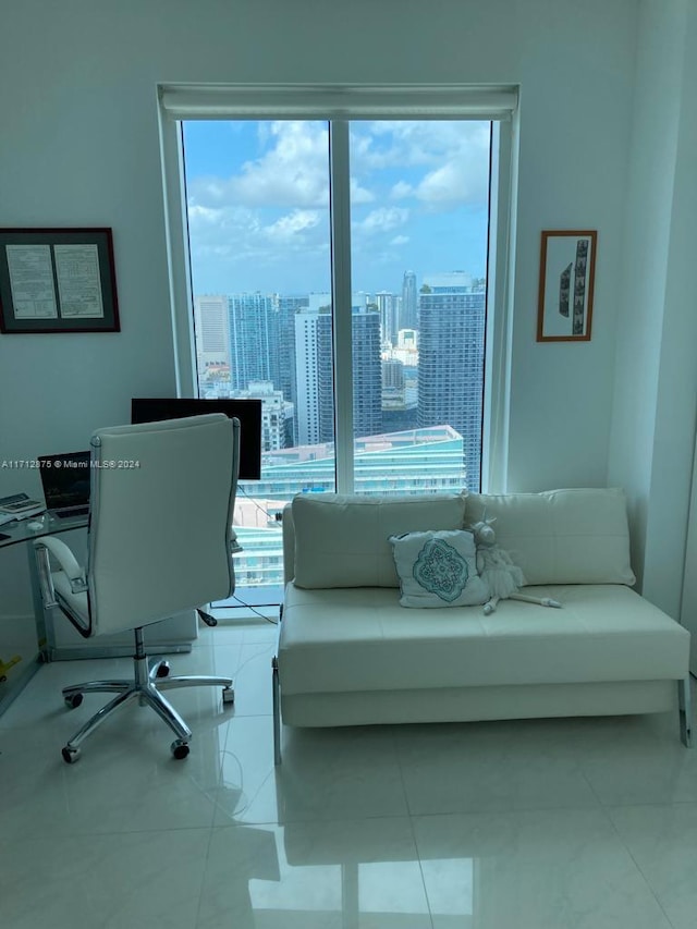 tiled home office featuring plenty of natural light