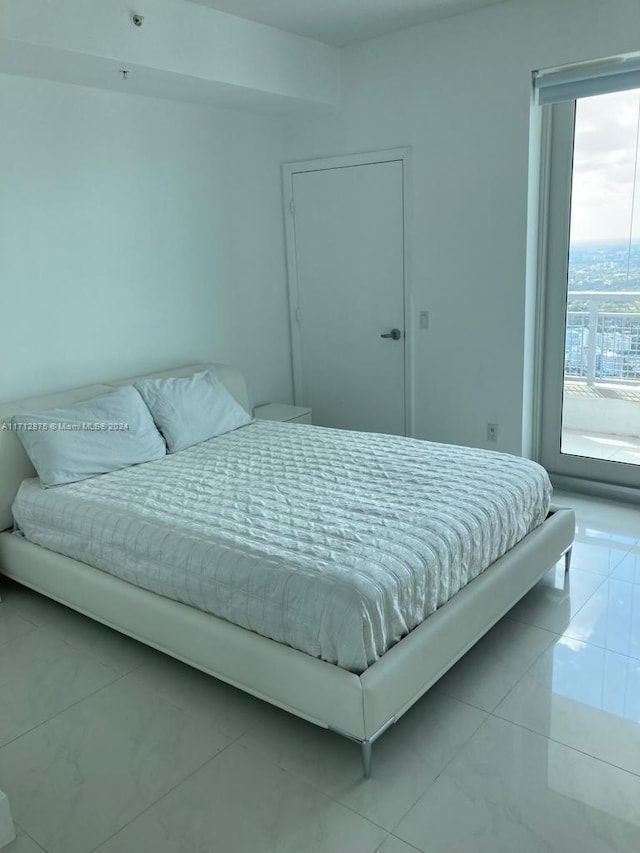 bedroom featuring multiple windows