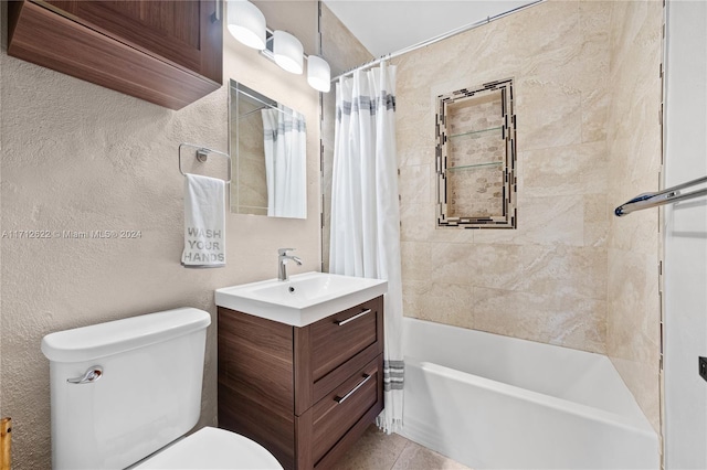 full bathroom featuring tile patterned flooring, vanity, toilet, and shower / bathtub combination with curtain