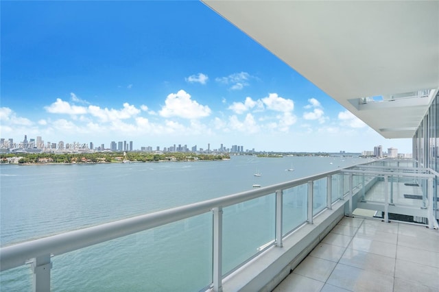 balcony featuring a water view