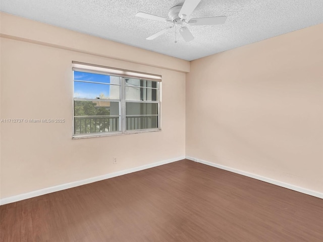 unfurnished room featuring wood-type flooring, a textured ceiling, and ceiling fan