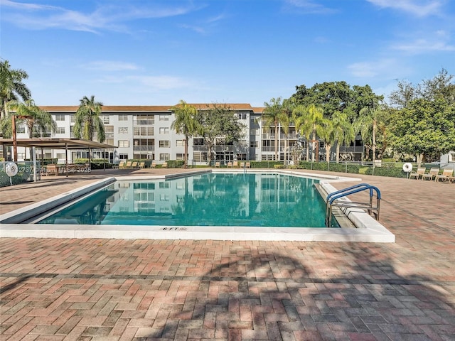 view of swimming pool featuring a patio