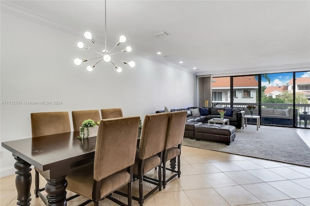 tiled dining space featuring a chandelier, expansive windows, and crown molding