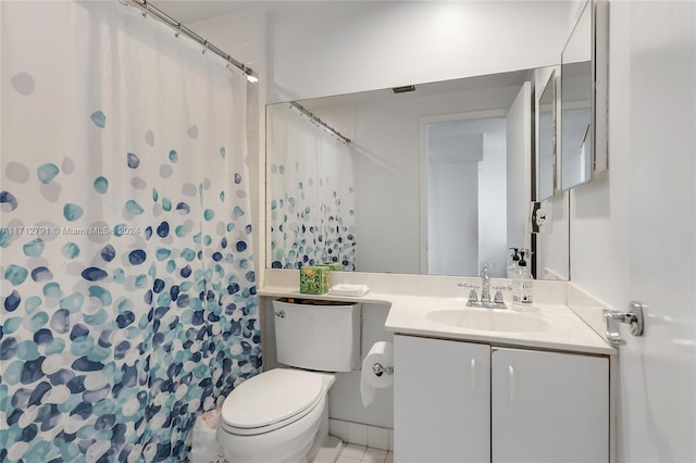 bathroom with tile patterned floors, vanity, toilet, and a shower with curtain