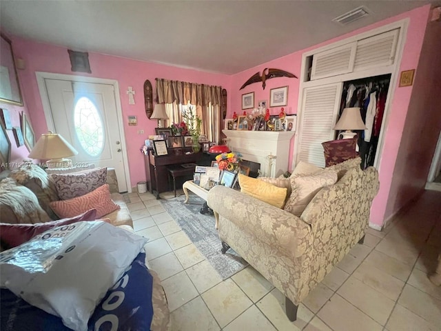 living room featuring light tile patterned flooring